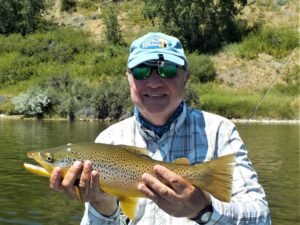 Al Roy with Fish on the Big Horn River