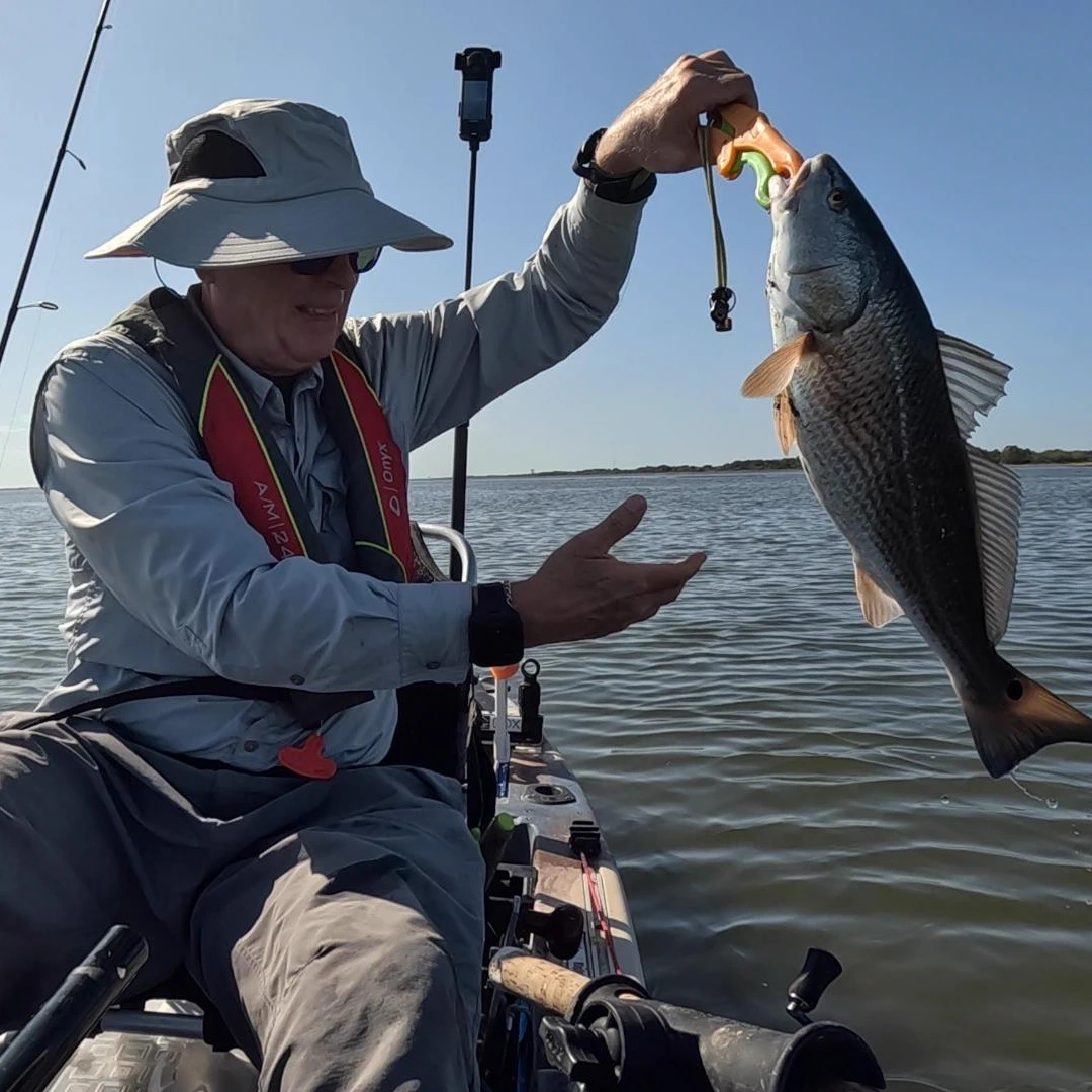 redfish in kayak